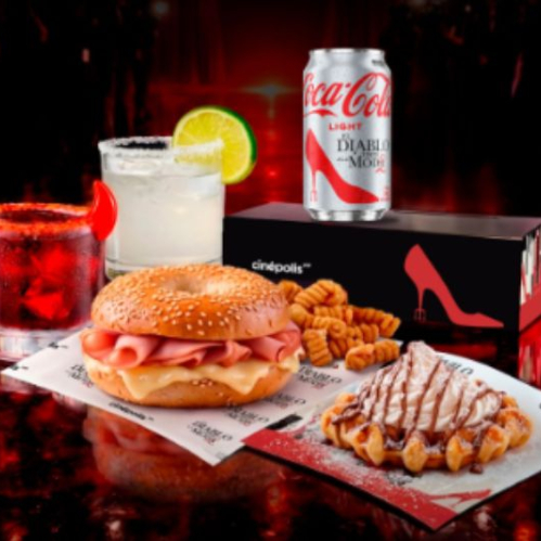 Promoción de Cinépolis con alimentos y bebidas temáticas inspiradas en El Diablo Viste a la Moda, acompañadas de un menú especial y elementos visuales en tonos rojos.