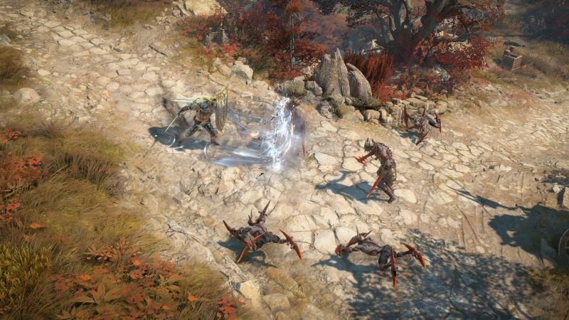 Hechicero en combate – Diablo IV Figura mágica lanzando un hechizo mientras criaturas lo atacan en un bosque otoñal.