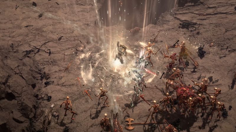 Batalla contra hordas – Diablo IV Guerrero liberando un ataque energético contra una horda de esqueletos.