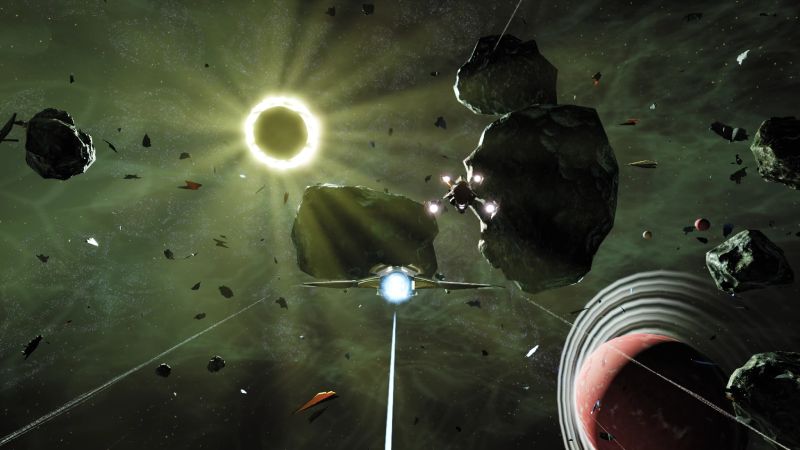 Nave del jugador volando hacia un eclipse solar brillante rodeado de rocas espaciales y la órbita de un planeta rojo.