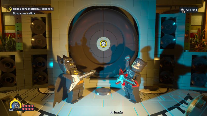 Batman LEGO tocando guitarra eléctrica frente a una bóveda.